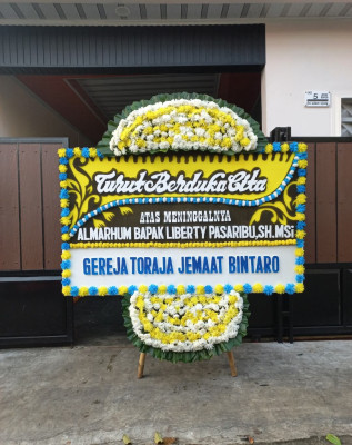 Papan Bunga Duka di Triwidadi